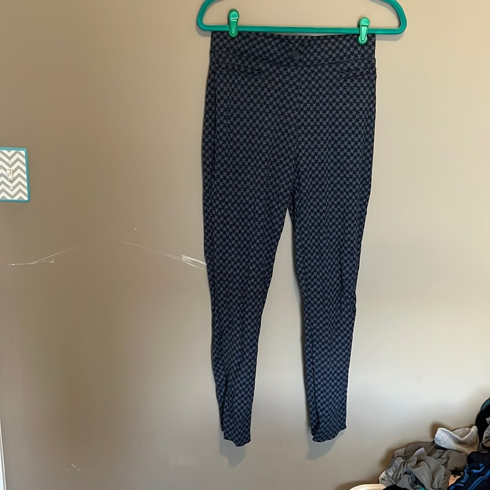 Beta brand straight let pants size medium. With little dogs hidden as pattern.